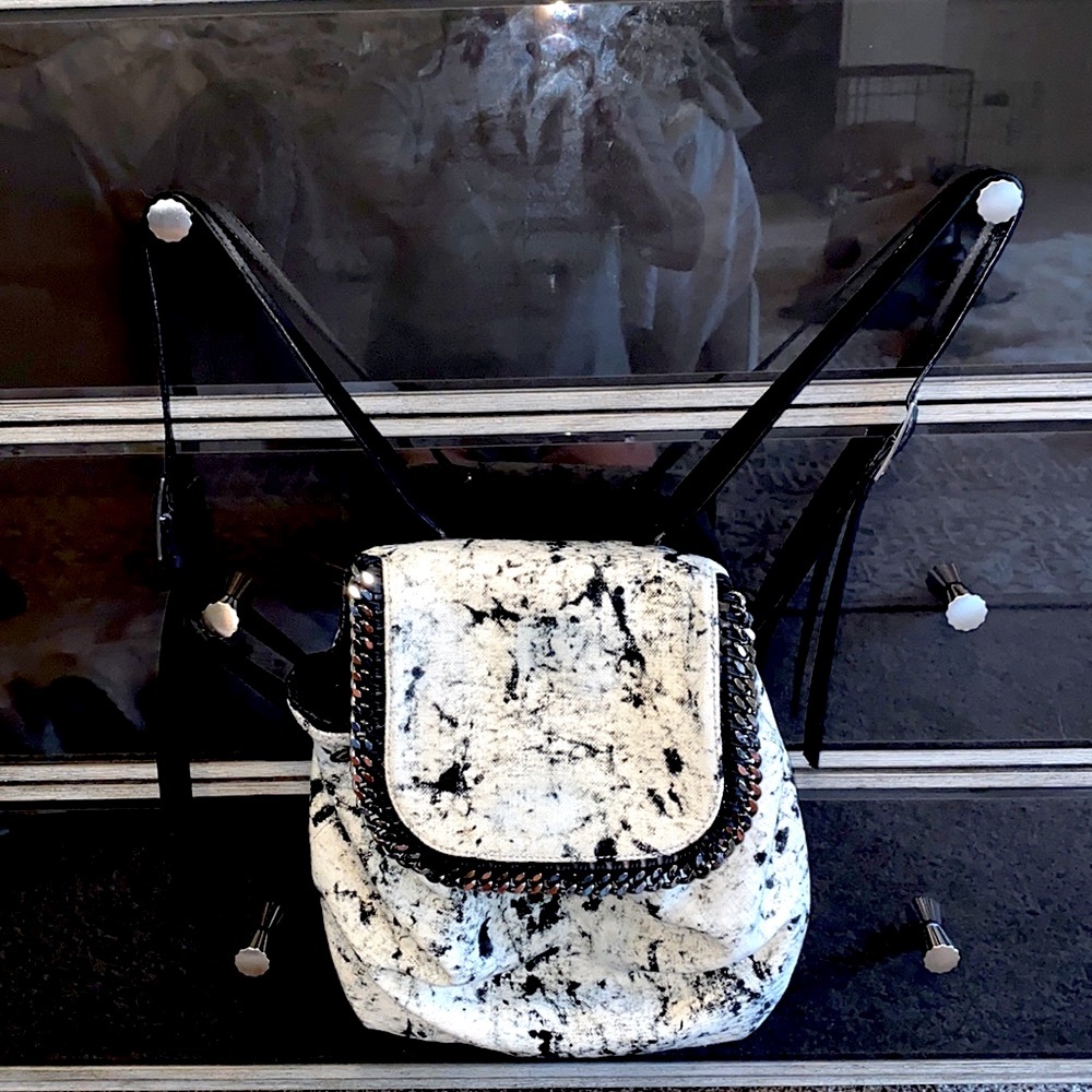 Stella McCartney backpack in black, grey and white w plenty of room! It’s a 💎